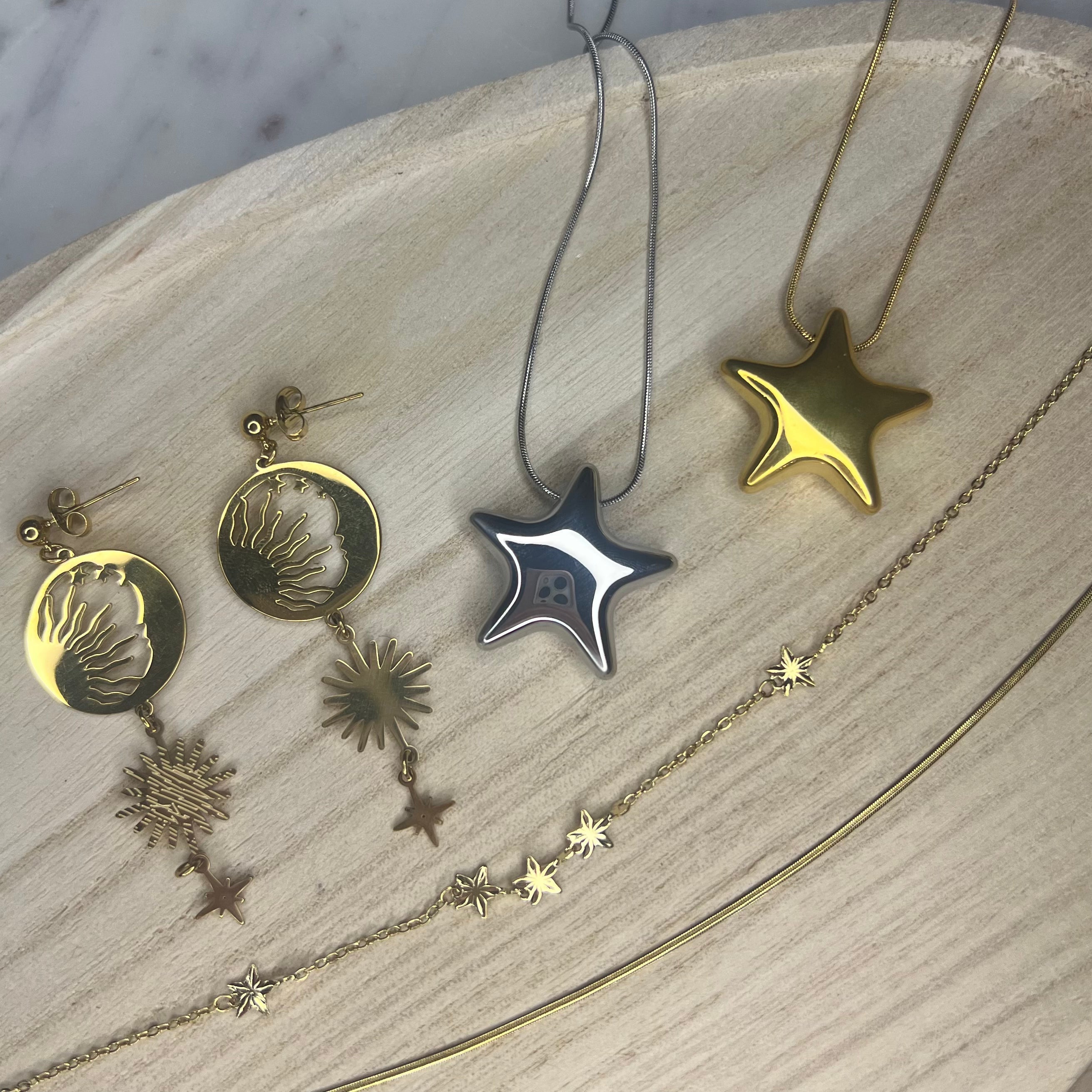 Betekenis van maan- en ster-sieraden voor rust en zelfvertrouwen